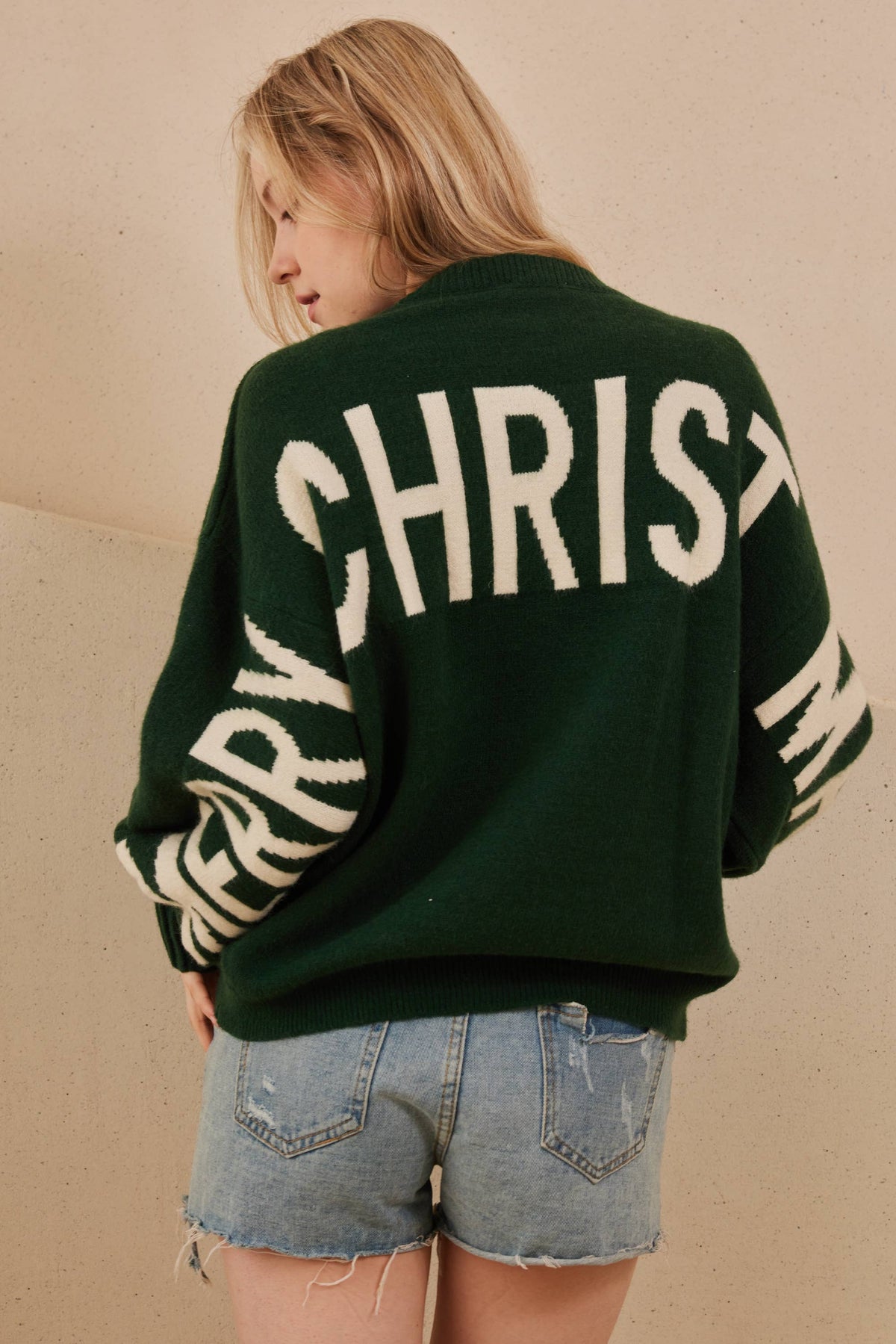 The Holiday Headlines Sweater