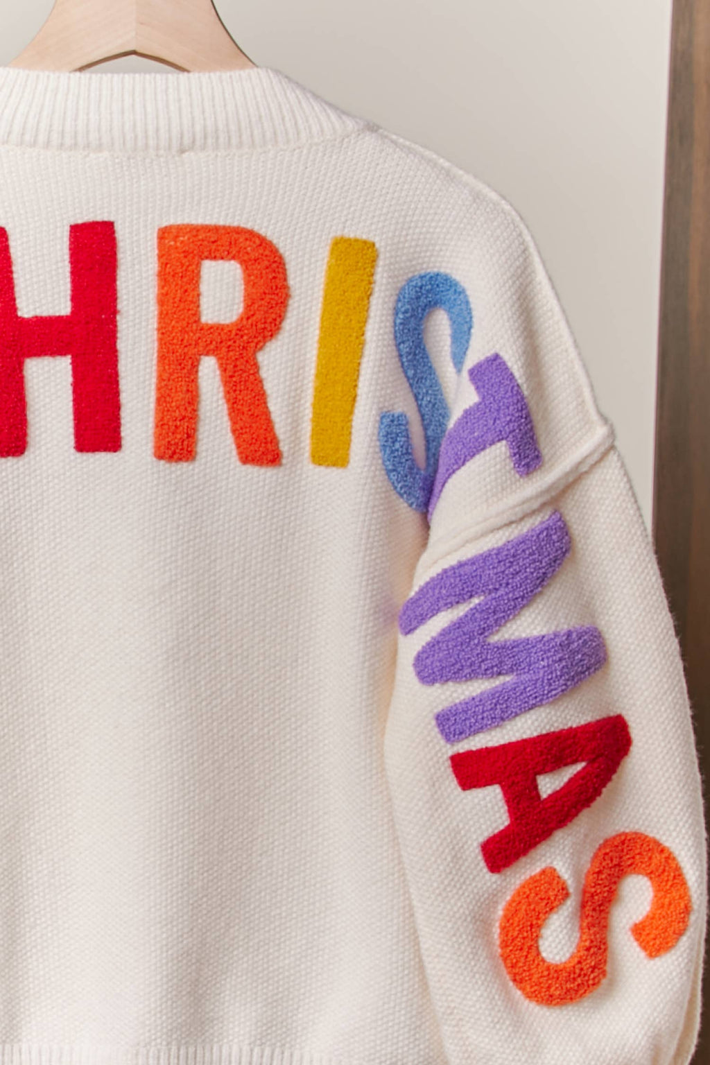 The Holiday Headlines Sweater