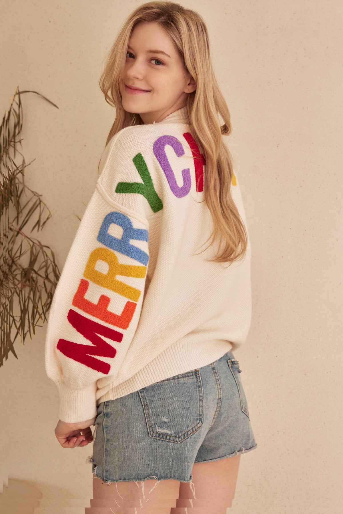 The Holiday Headlines Sweater