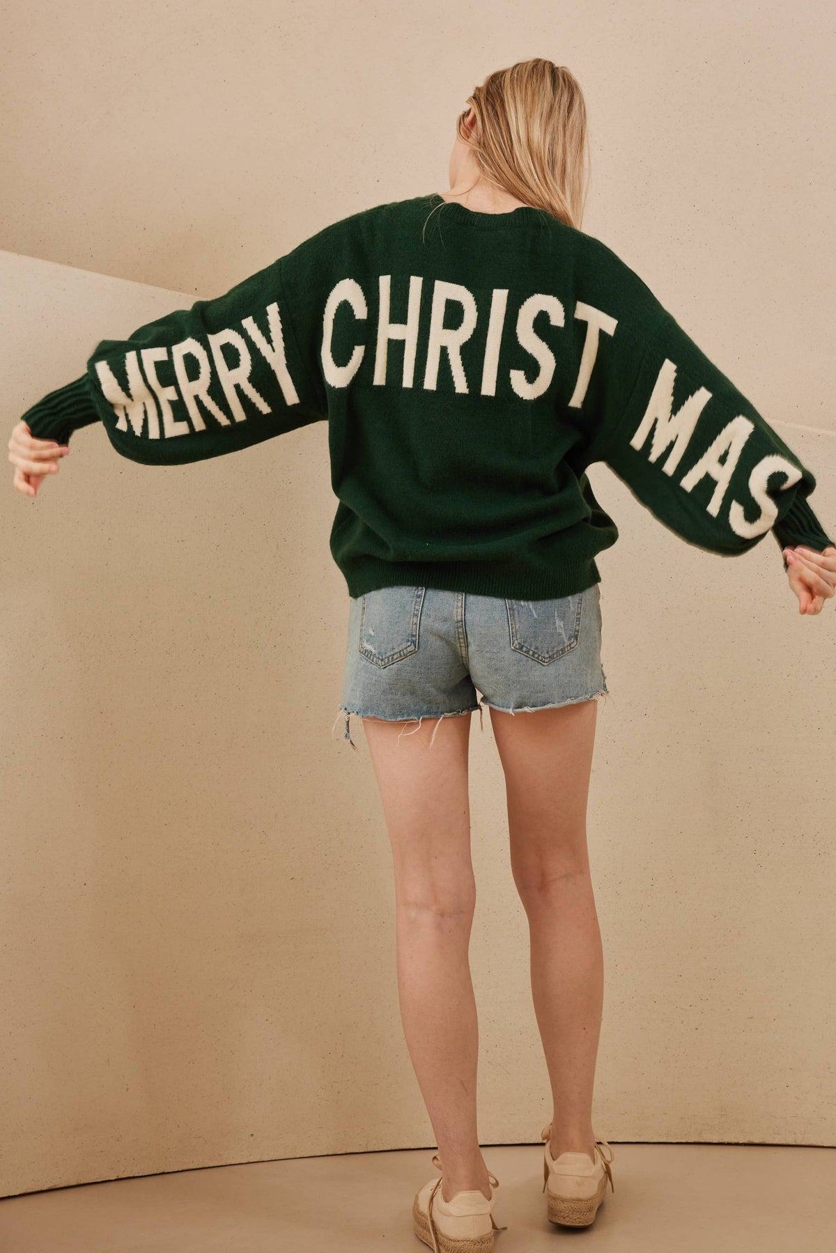 The Holiday Headlines Sweater